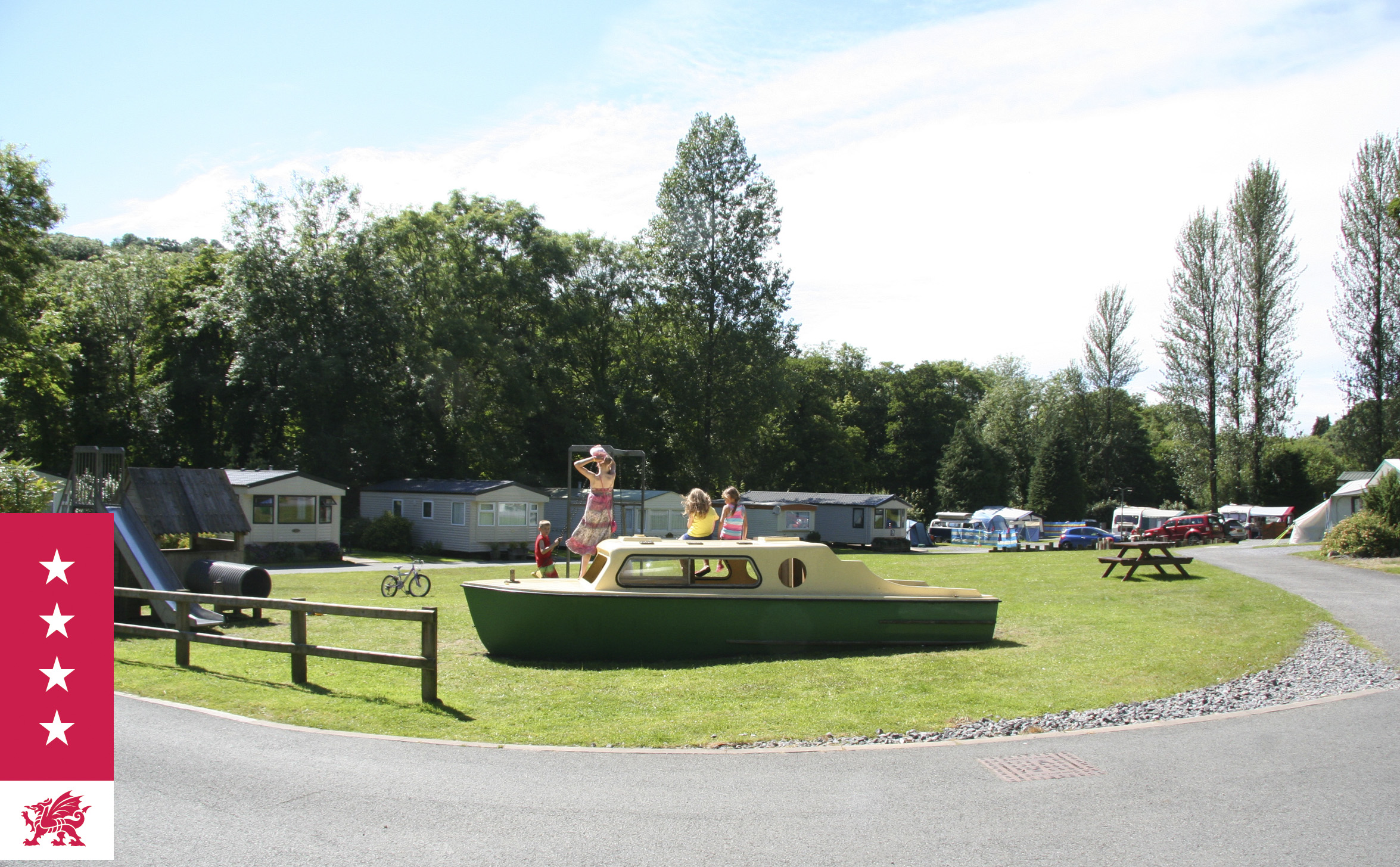 Touring Caravan Park with Tent Pitches and Static Caravan Holiday Homes situated around the central play area